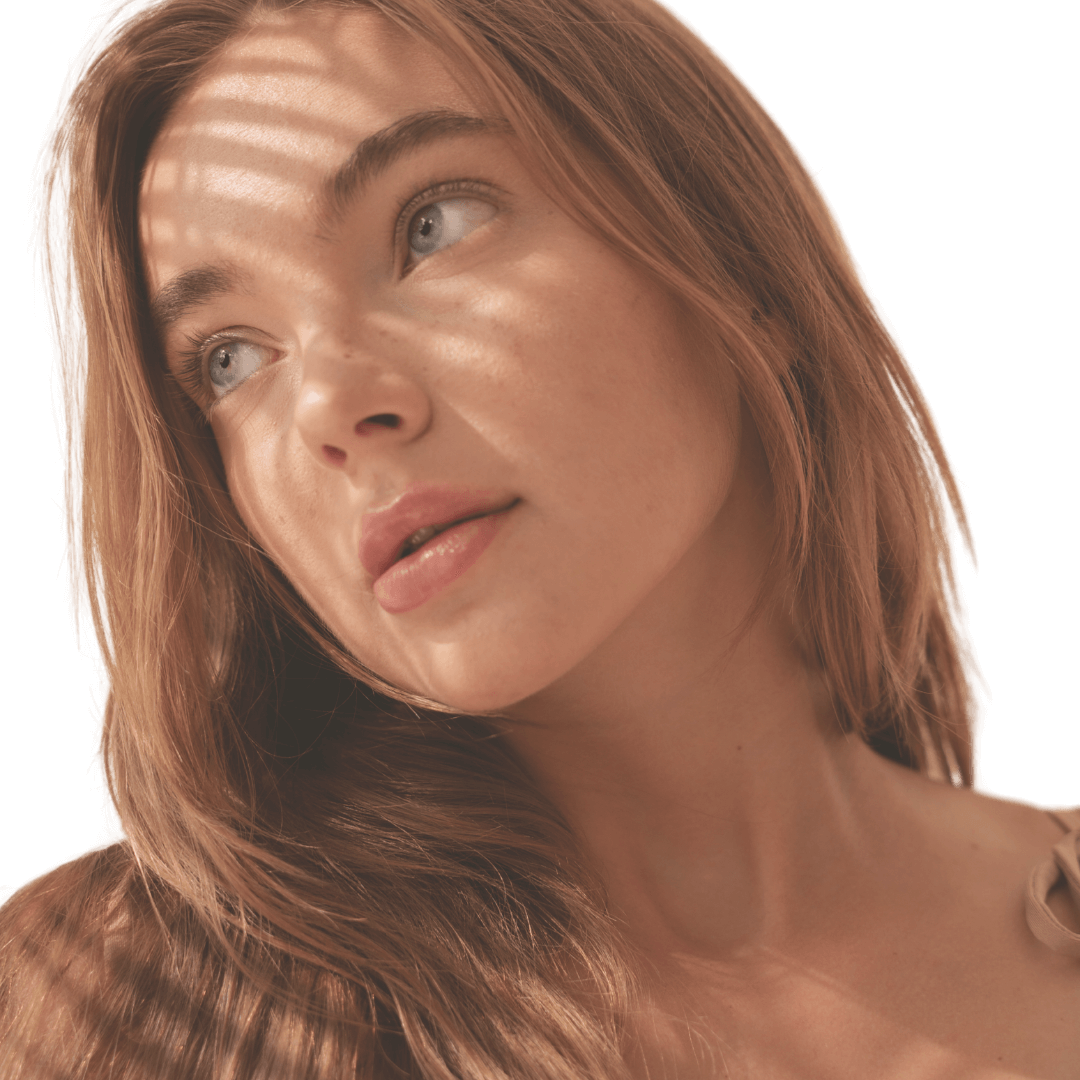 Portrait of a woman in warm sunlight